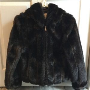 Faux fur woman’s jacket gently used